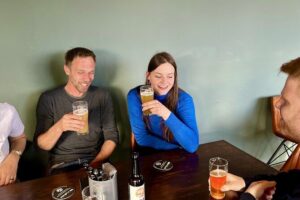 Berlin Craft Beer & Cultural Tour With Snack - Friedrichshain: East Berlin street art with beer in hand