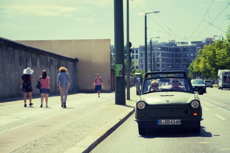 Berlin: The Wall Ride Guided Trabi Tour - Crossing through Checkpoint Charlie: why paperwork mattered