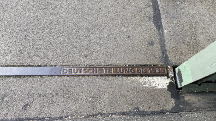 From Berlin: Kings, Crimes, & Spies Potsdam Day Trip by Van - Checkpoint Bravo: standing in the line between systems